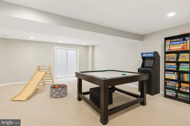 a view of a room with furniture and window