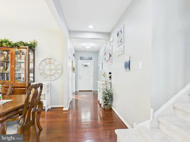 a view of entryway with wooden floor