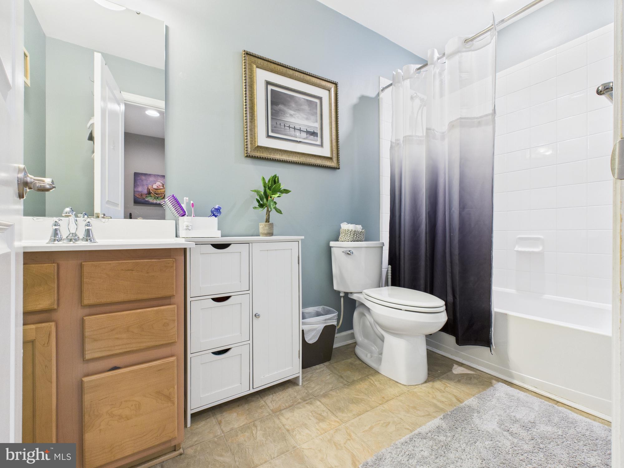 5 Madison Drive Spring City, PA 19475 - Photo 24 of 36 a bathroom with a toilet sink and a mirror