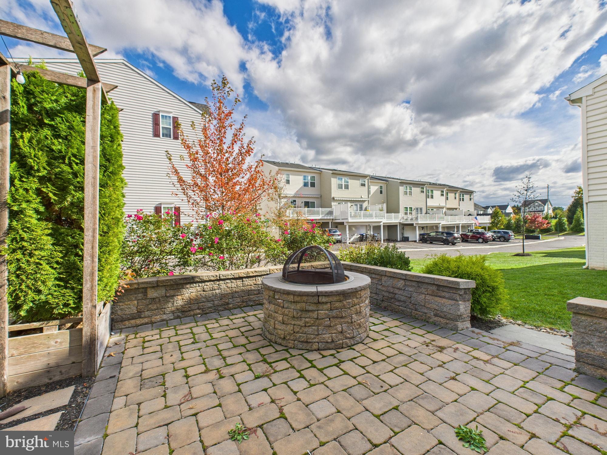 5 Madison Drive Spring City, PA 19475 - Photo 32 of 36 a view of a patio with chair and tables back yard of the house