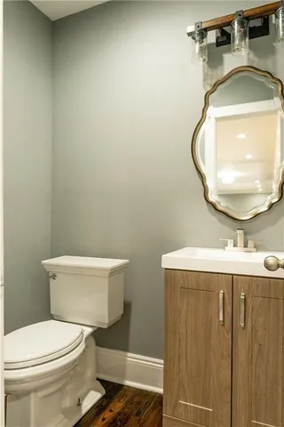 a kitchen with stainless steel appliances granite countertop a stove a sink a refrigerator and a microwave