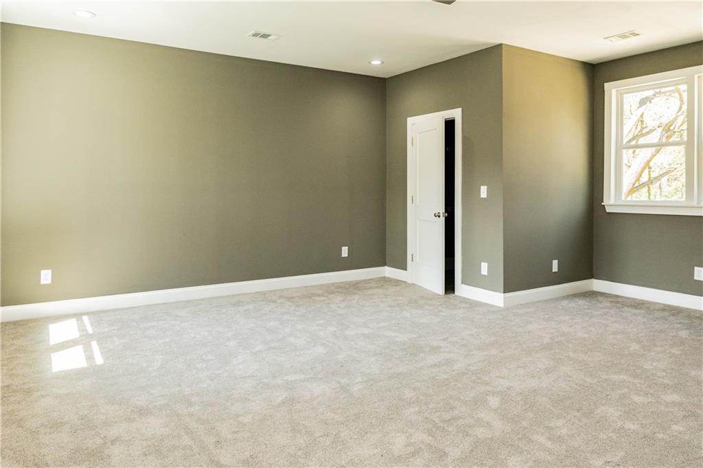 1433 Merriman Lane Northeast Atlanta, GA 30324 - Photo 42 of 60 a view of an empty room with a window
