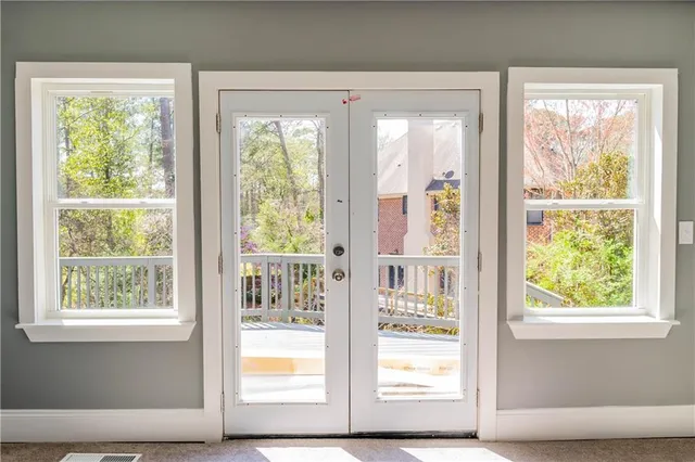 a view of balcony with furniture