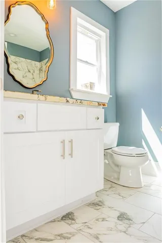 a view of a balcony with wooden floor