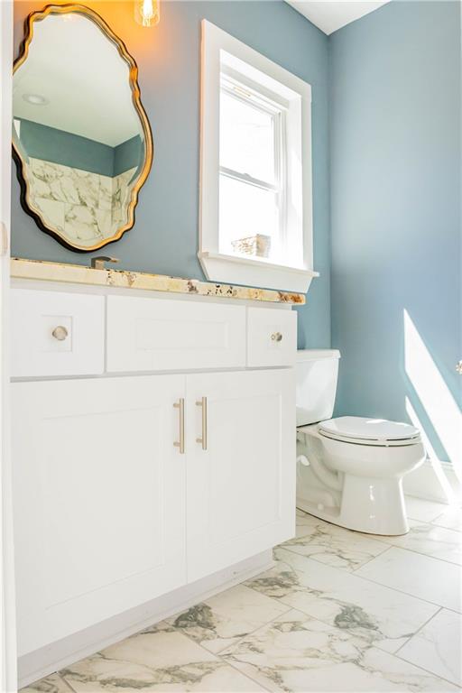 1433 Merriman Lane Northeast Atlanta, GA 30324 - Photo 49 of 60 a bathroom with a sink and a mirror