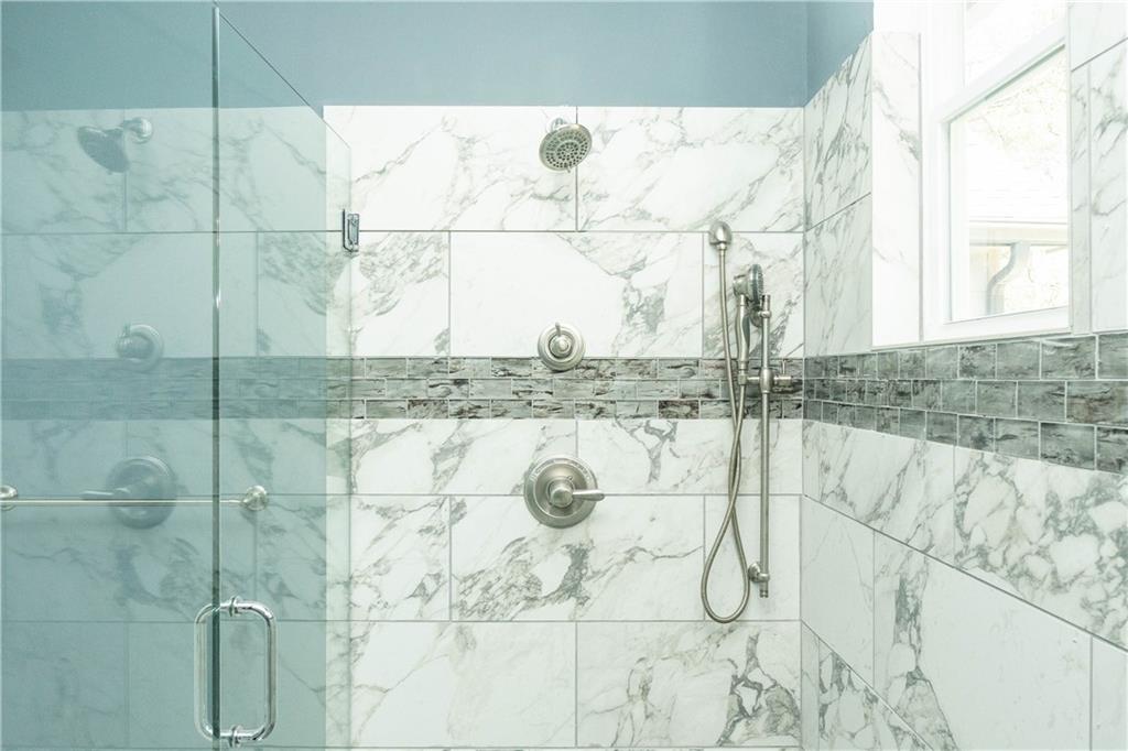 1433 Merriman Lane Northeast Atlanta, GA 30324 - Photo 51 of 60 a bathroom with a shower