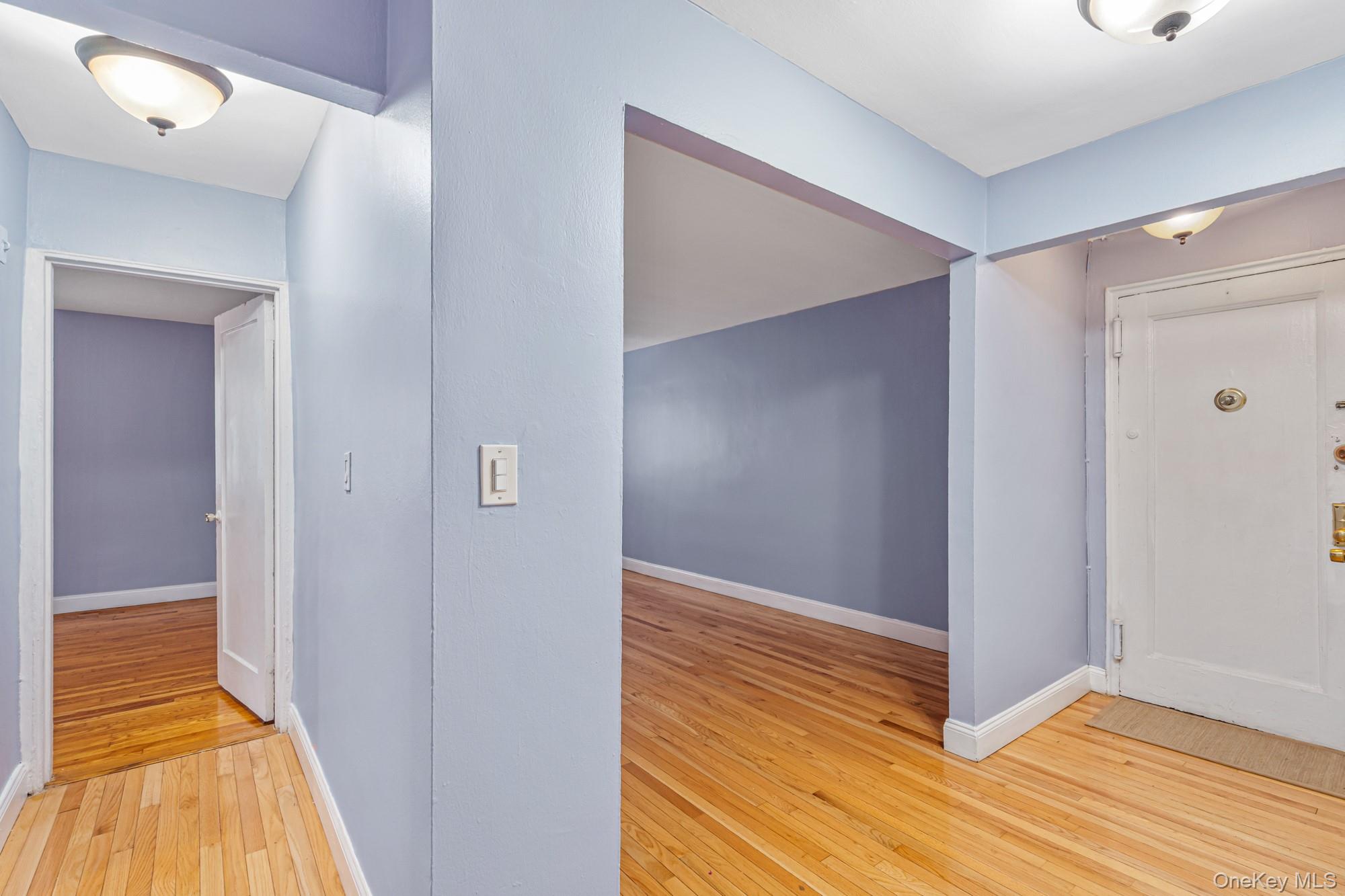 102-55 67th Road, Unit 2V Queens, NY 11375 - Photo 6 of 14 a view of hallway with wooden floor
