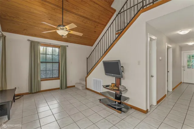a view of a chairs and table in a patio