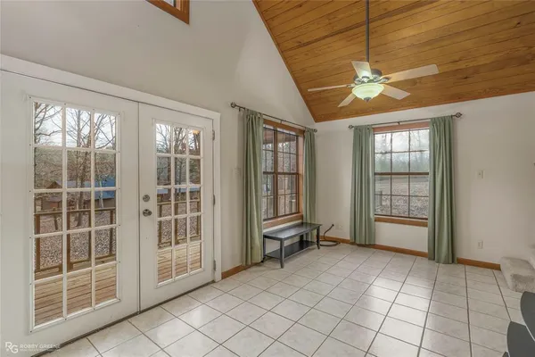 a kitchen with stainless steel appliances granite countertop a refrigerator a sink and a stove