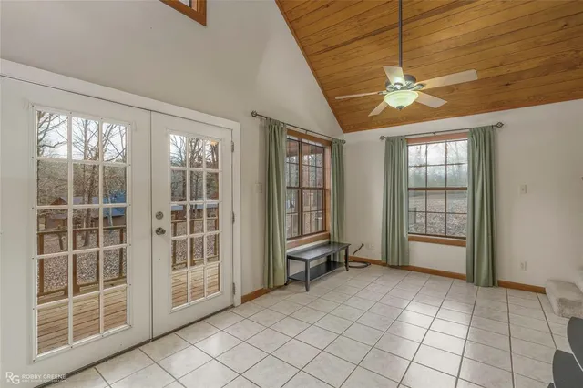 a kitchen with stainless steel appliances granite countertop a refrigerator a sink and a stove