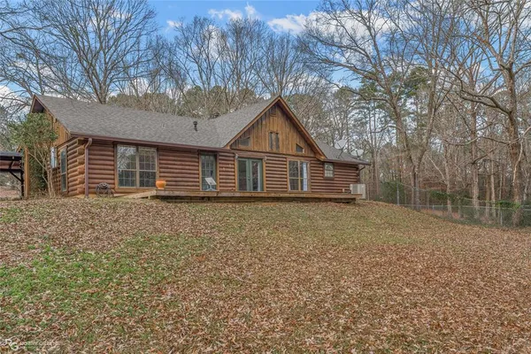 a house with trees in front of it