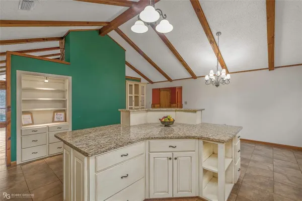 a view of a hallway with washer and dryer