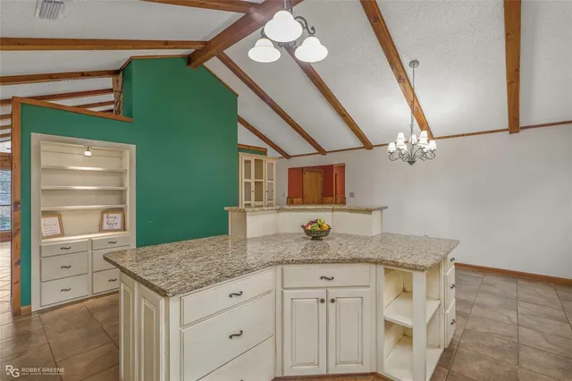a view of a hallway with washer and dryer