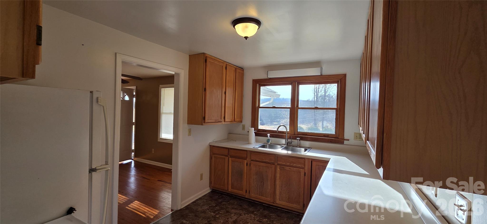212 Old Dale Road Spruce Pine, NC 28777 - Photo 13 of 30 a bathroom with a sink and a mirror