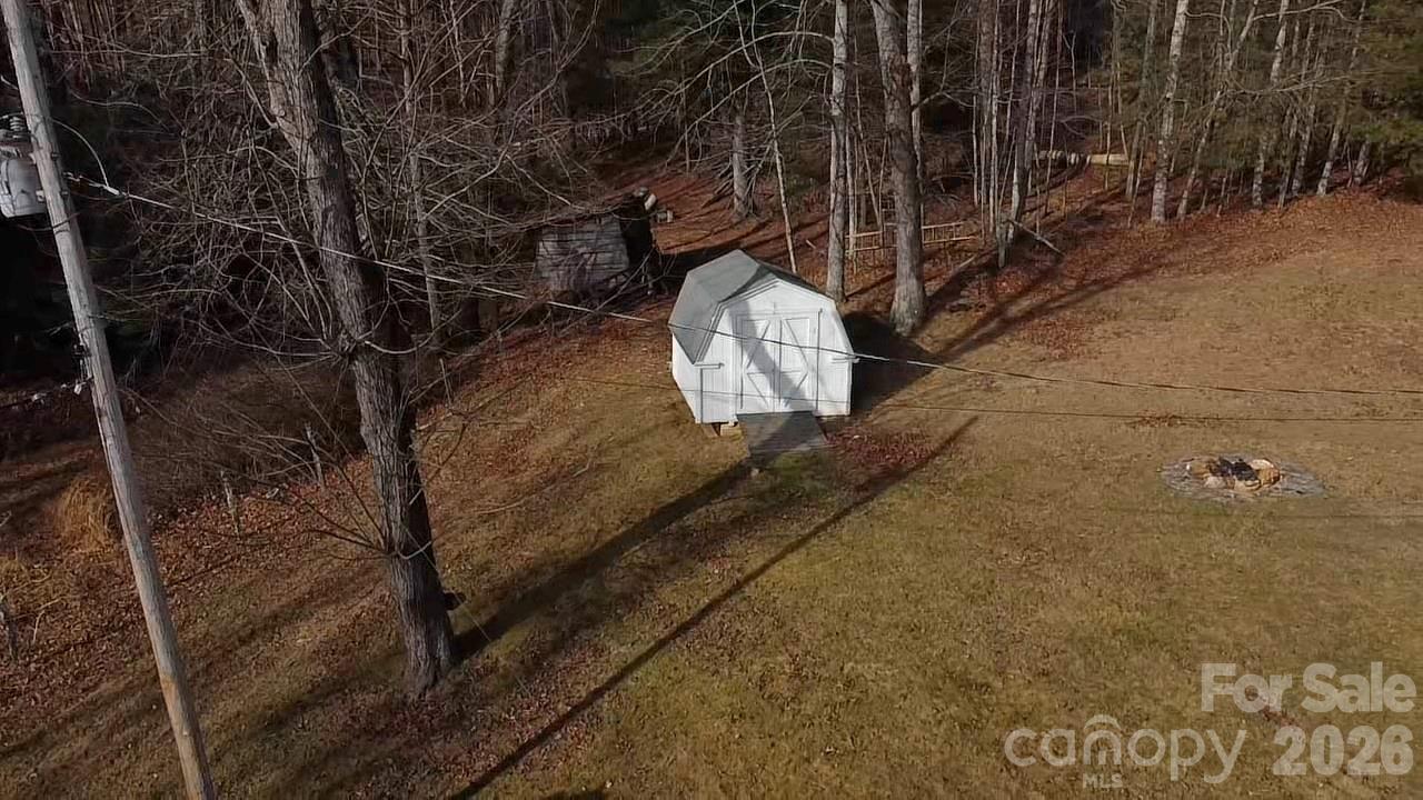 212 Old Dale Road Spruce Pine, NC 28777 - Photo 10 of 30 a view of a backyard of a house