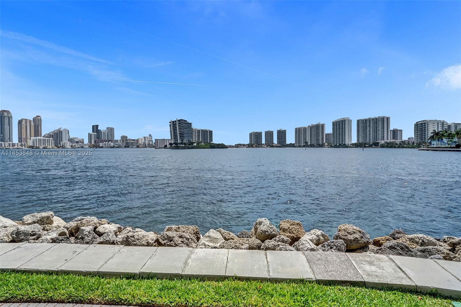 3530 Mystic Pointe Drive, Unit 2915 Aventura, FL 33180 - Photo 28 of 41 a view of lake and city with tall buildings