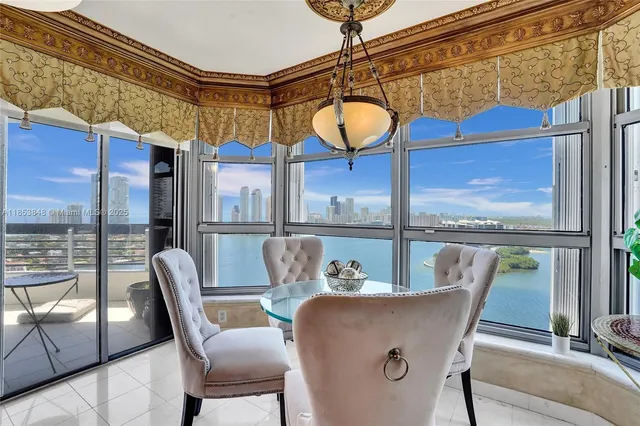 a view of a dining room with furniture window and outside view