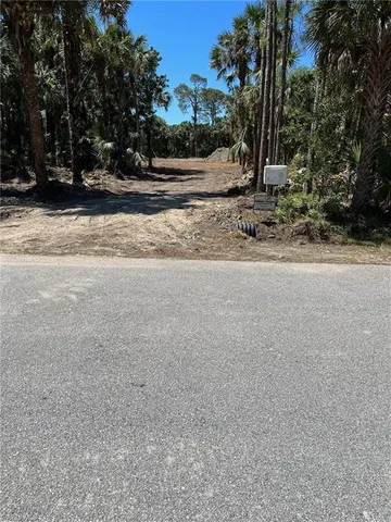 a view of road with trees