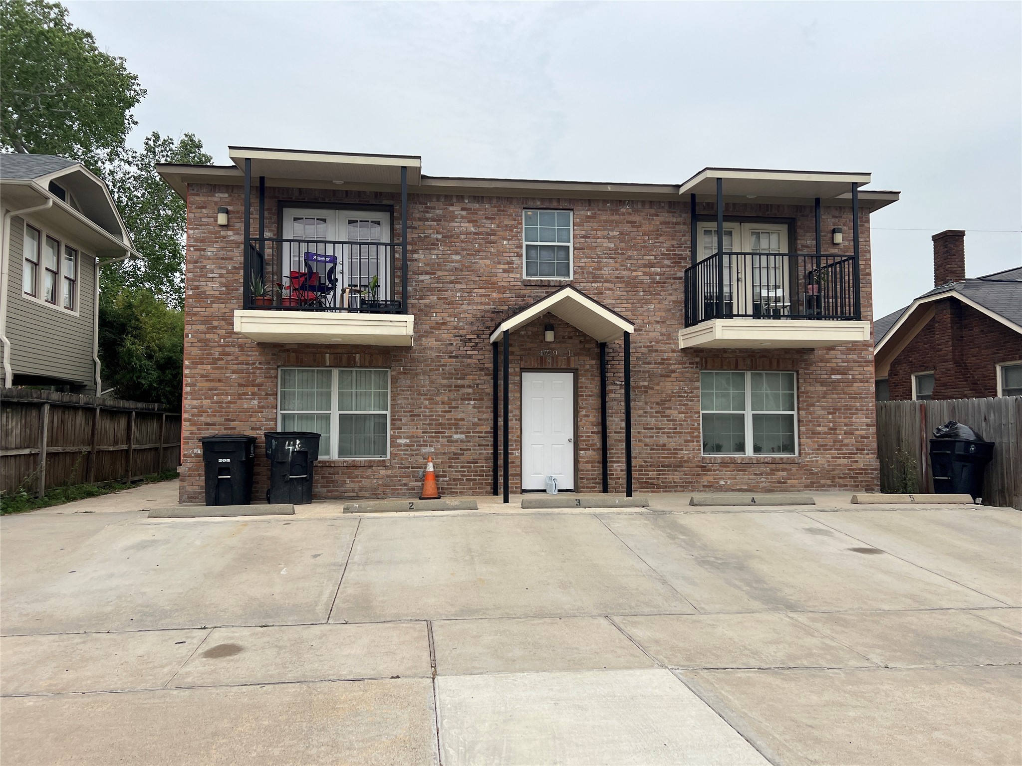 4719 Clay Street, Unit 2 Houston, TX 77023 - Photo 1 of 9 a view of a building with many windows