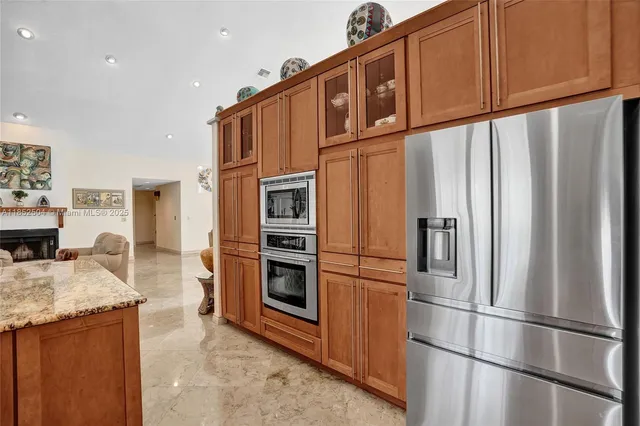 a bedroom with furniture and a flat screen tv