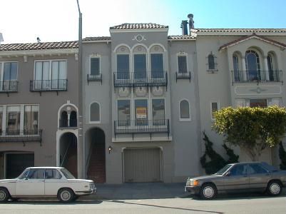 a car parked in front of a house