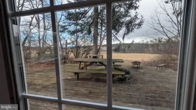 a view of a balcony with chairs