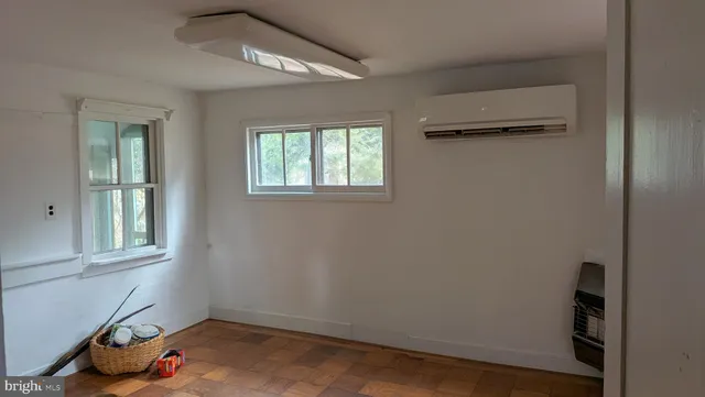 an empty room with windows