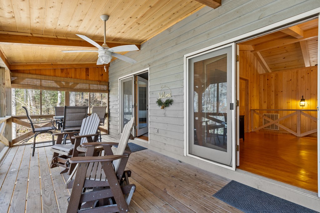 464 Twin Creeks Blue Ridge, GA 30513 - Photo 36 of 61 a dining room with glass door and furniture