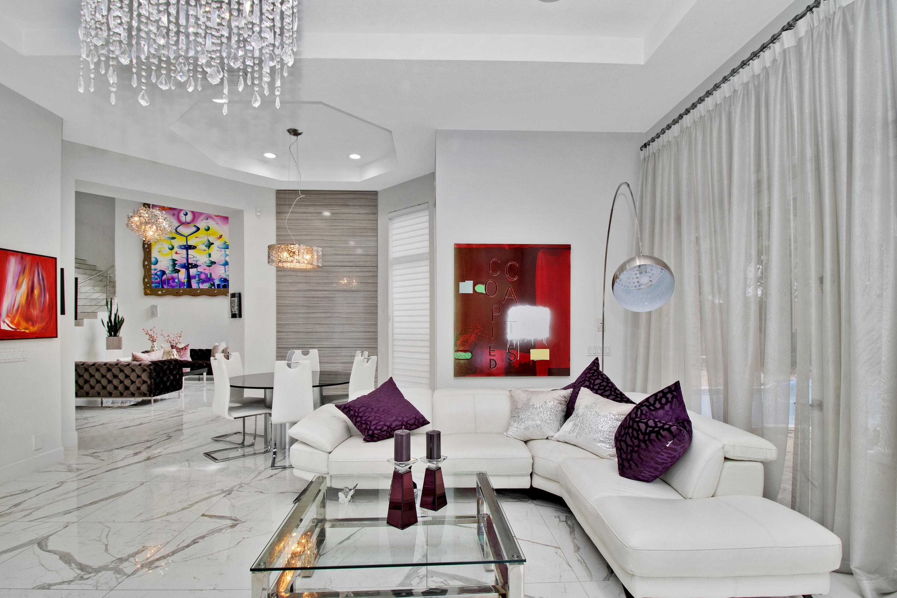 17729 Middlebrook Way Boca Raton, FL 33496 - Photo 36 of 88 a living room with furniture and a painting on the wall