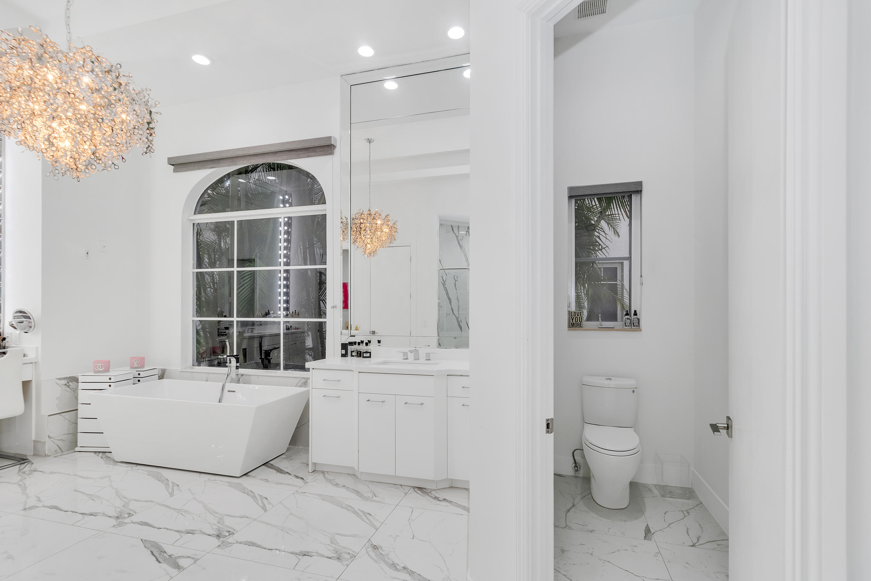 17729 Middlebrook Way Boca Raton, FL 33496 - Photo 43 of 88 a bathroom with a bathtub sink and toilet