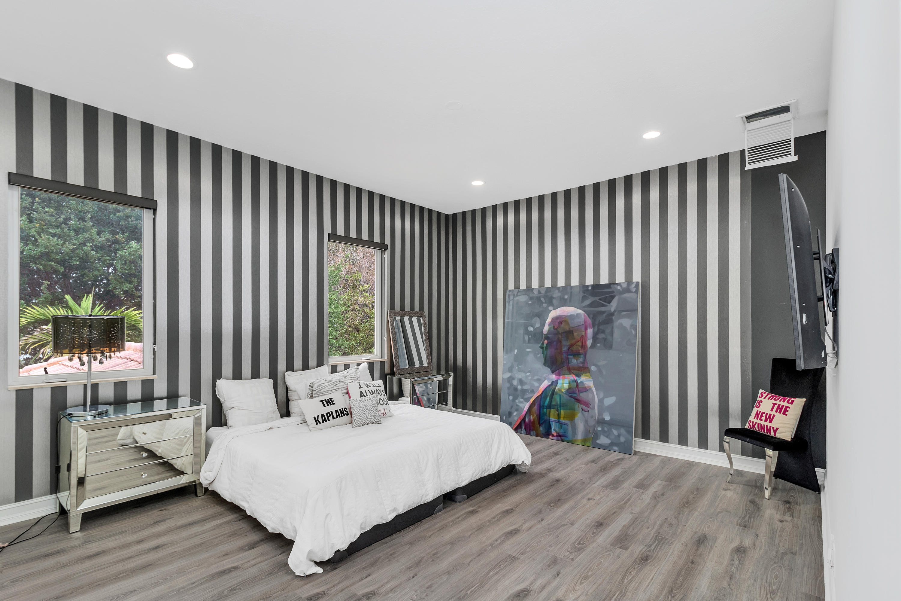 17729 Middlebrook Way Boca Raton, FL 33496 - Photo 47 of 88 a bedroom with a bed and a large window