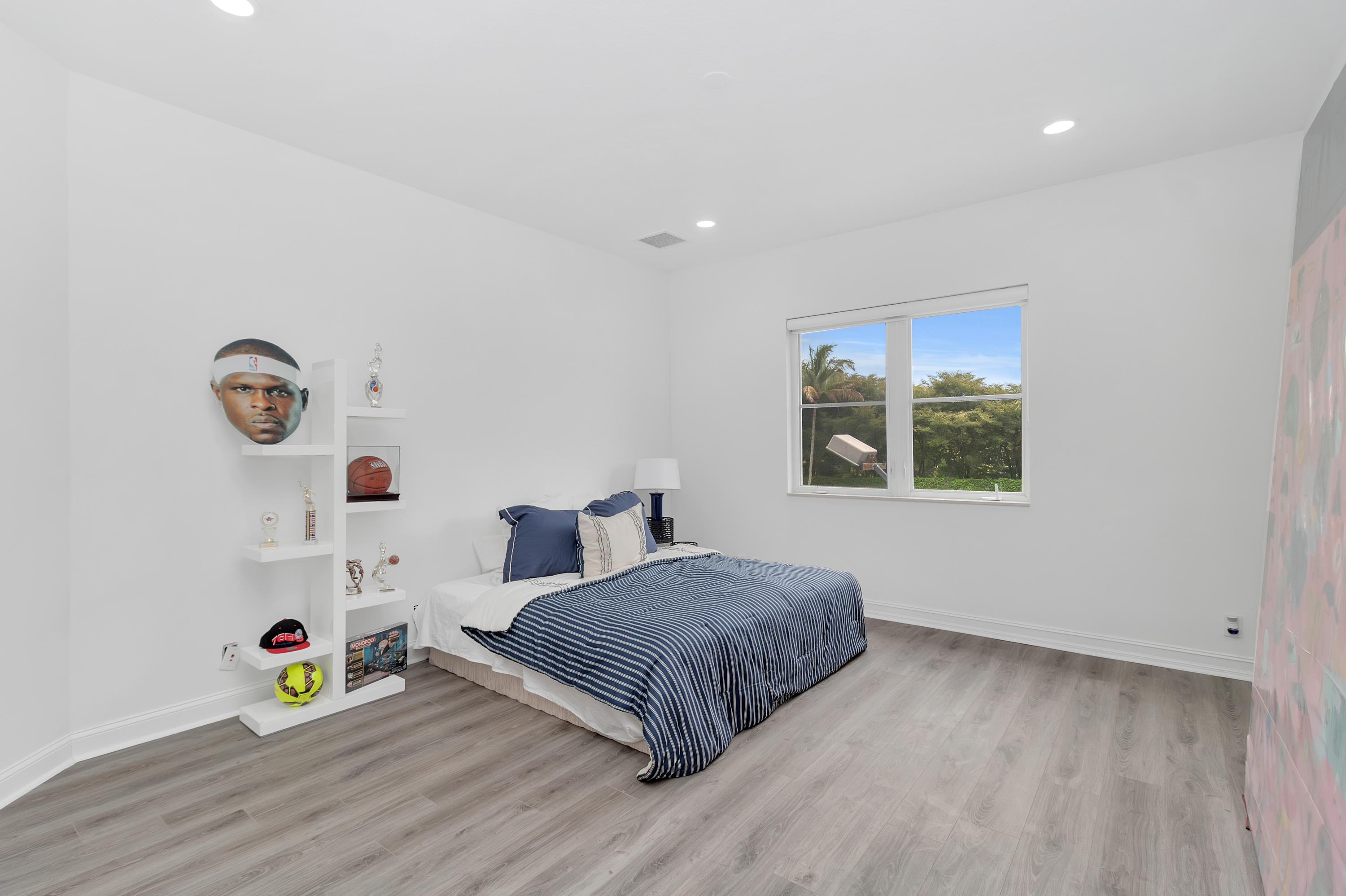 17729 Middlebrook Way Boca Raton, FL 33496 - Photo 52 of 88 a bedroom with a bed and a wooden floor