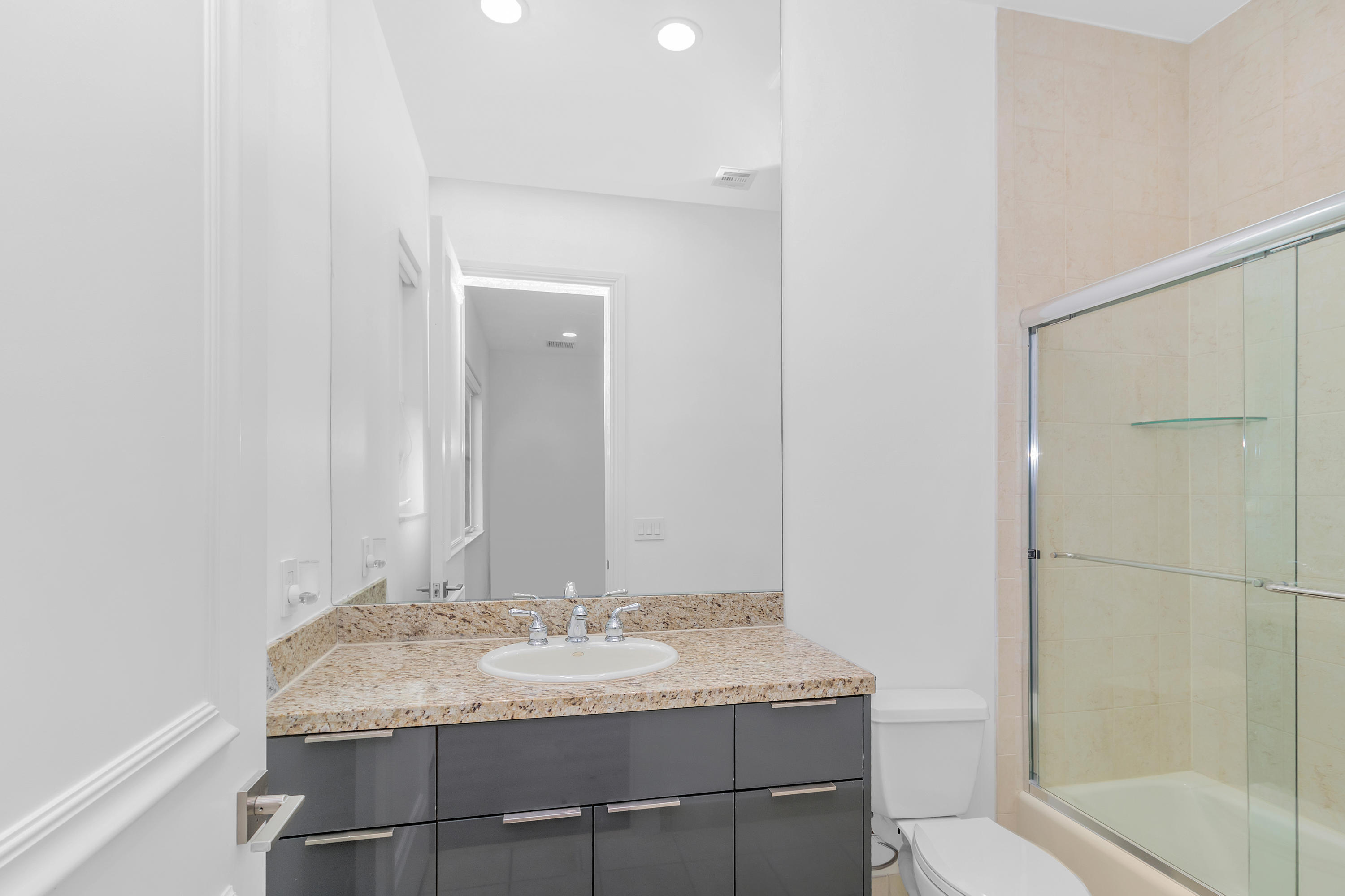 17729 Middlebrook Way Boca Raton, FL 33496 - Photo 53 of 88 a bathroom with a granite countertop sink and a mirror