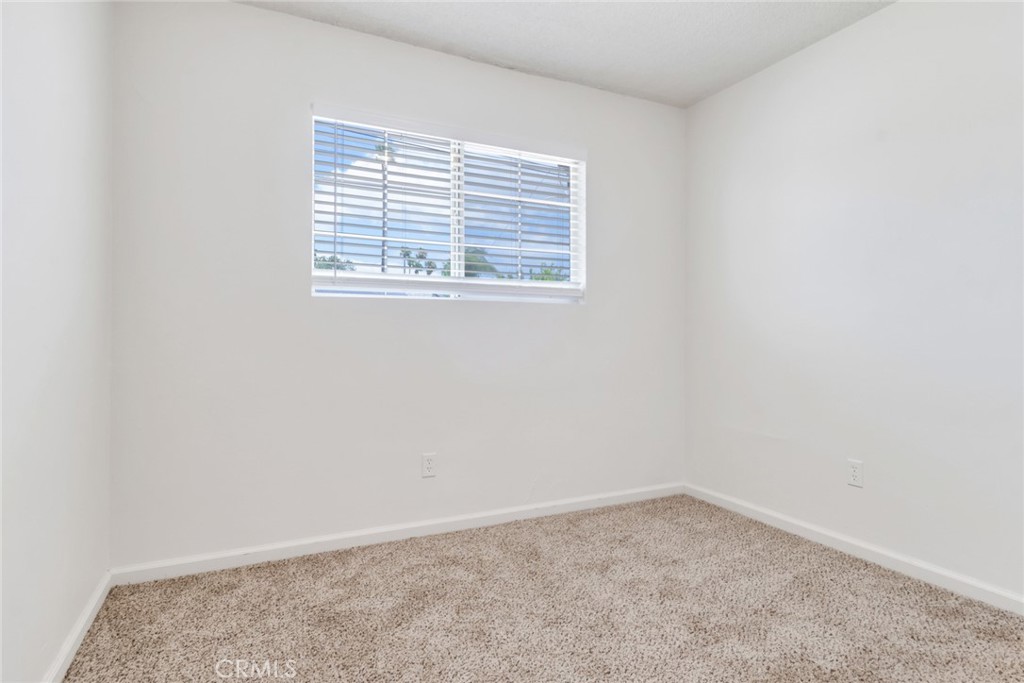 8955 Holly Lane Riverside, CA 92503 - Photo 12 of 32 an empty room with a window