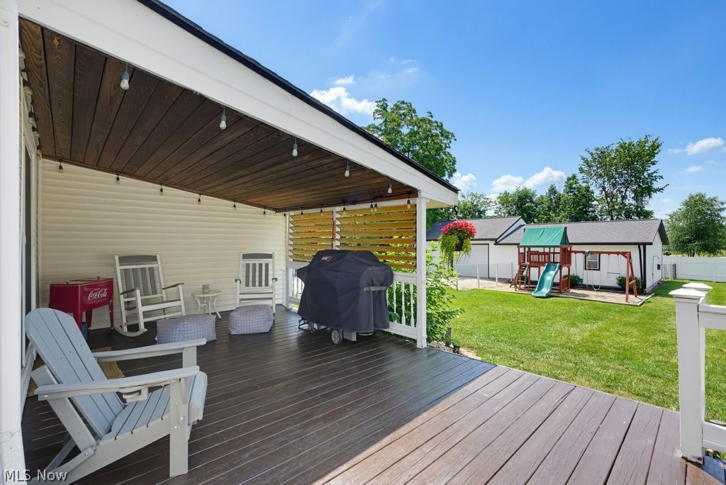 23055 Snell Road Columbia Station, OH 44028 - Photo 40 of 50 Covered deck featuring a wood-finish ceiling, string lighting, and slatted privacy screen
