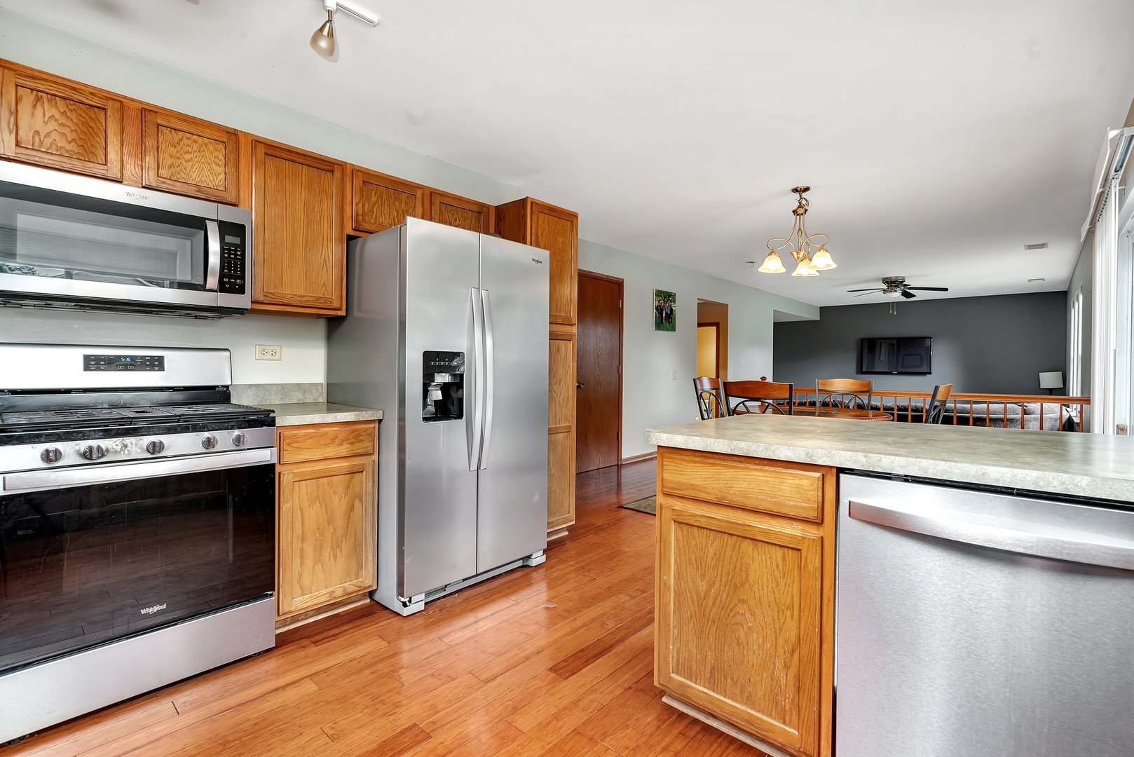 25940 South Bell Road Channahon, IL 60410 - Photo 8 of 29 a kitchen with stainless steel appliances granite countertop a refrigerator stove and a sink