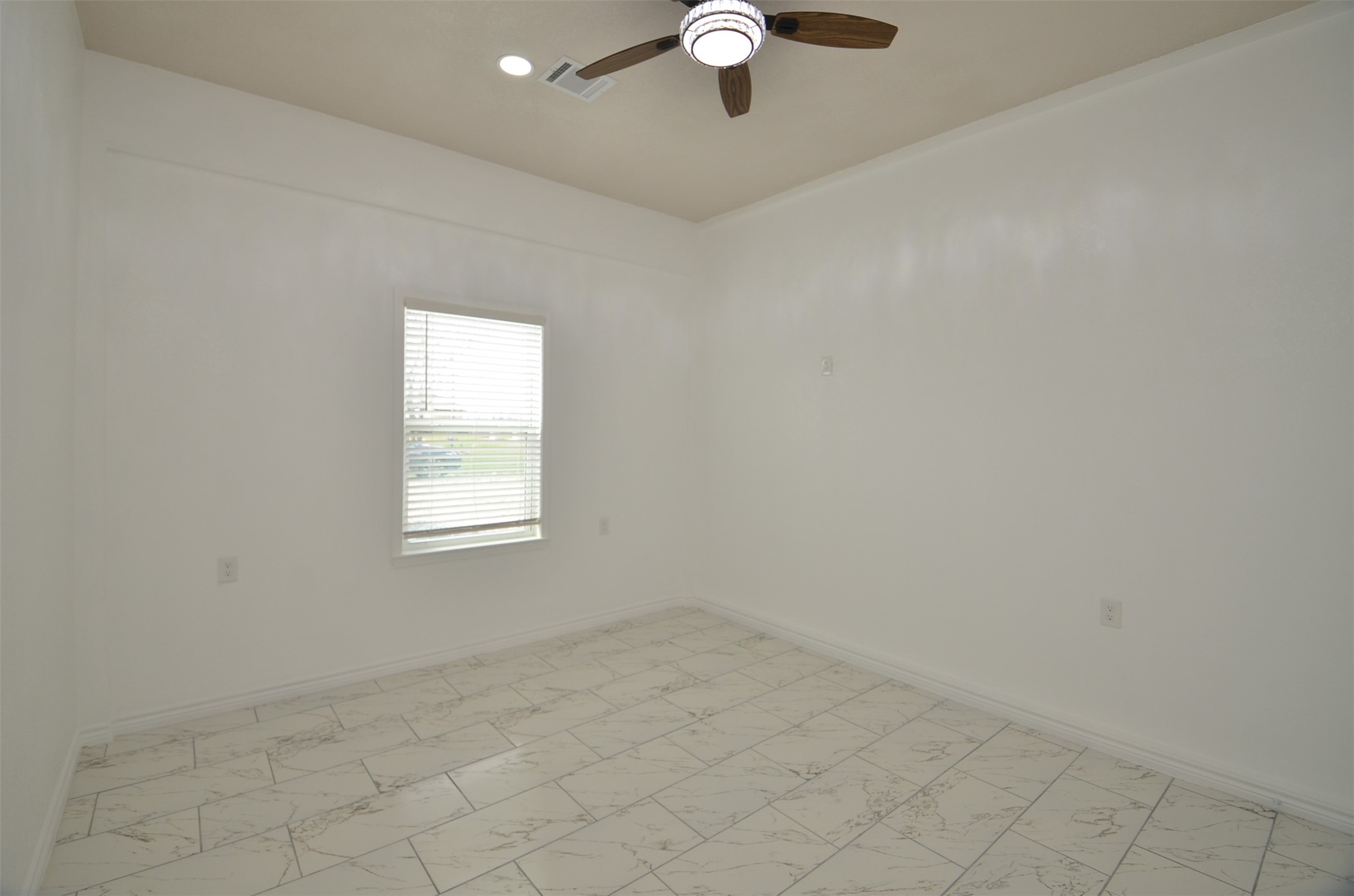 2002 West Airline County Road 55 Rosharon, TX 77583 - Photo 18 of 23 an empty room with a window