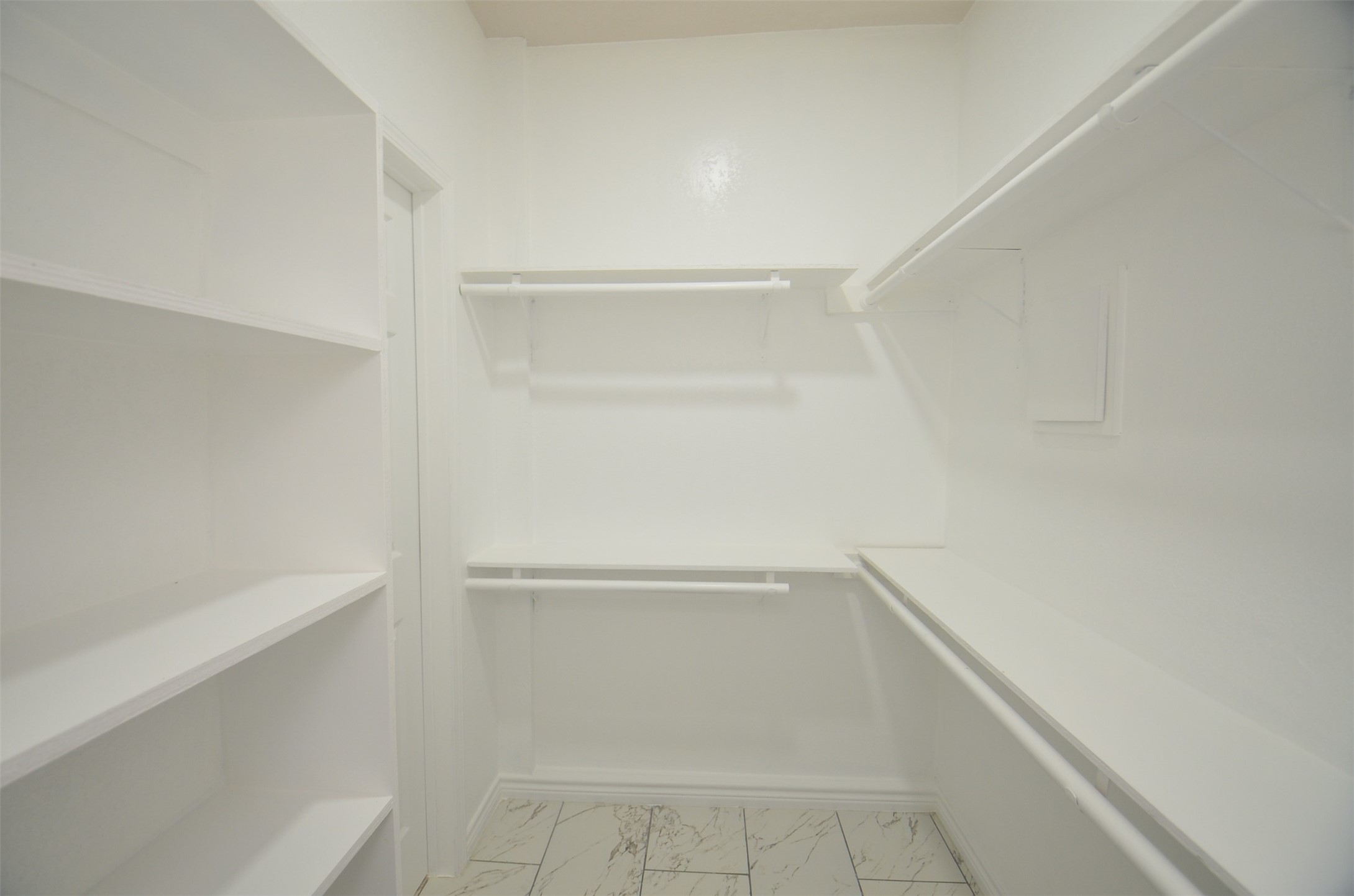 2002 West Airline County Road 55 Rosharon, TX 77583 - Photo 19 of 23 a view of an empty walk in closet