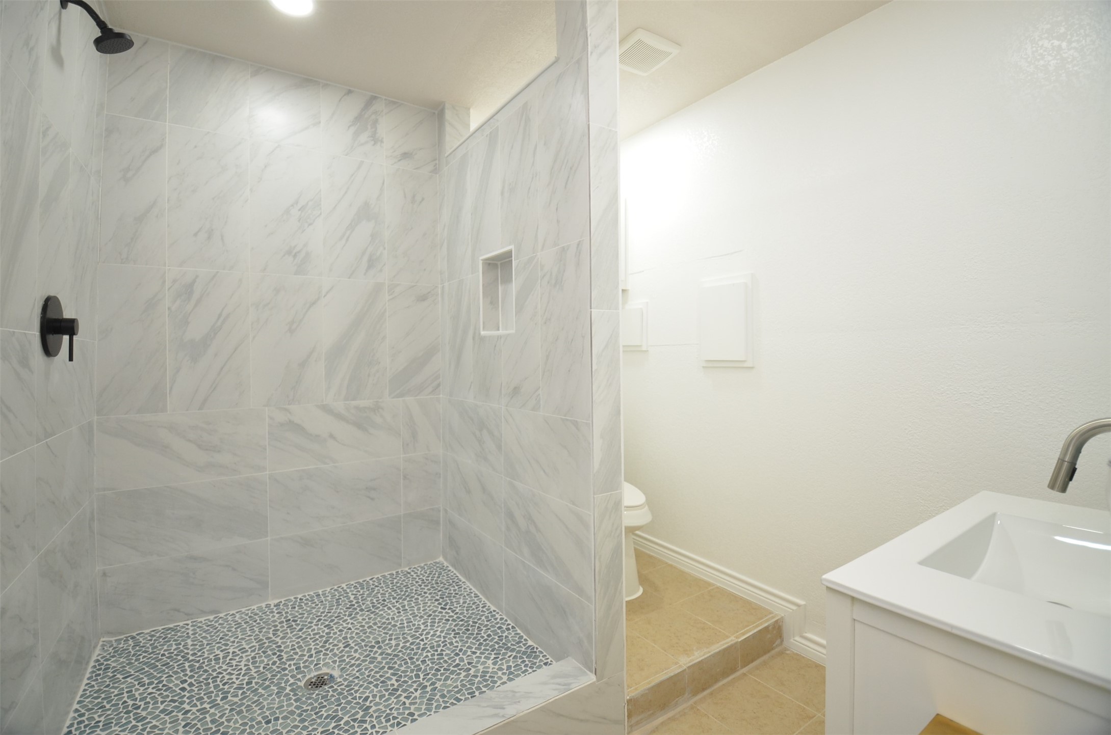 2002 West Airline County Road 55 Rosharon, TX 77583 - Photo 20 of 23 a bathroom with a sink a shower and a mirror