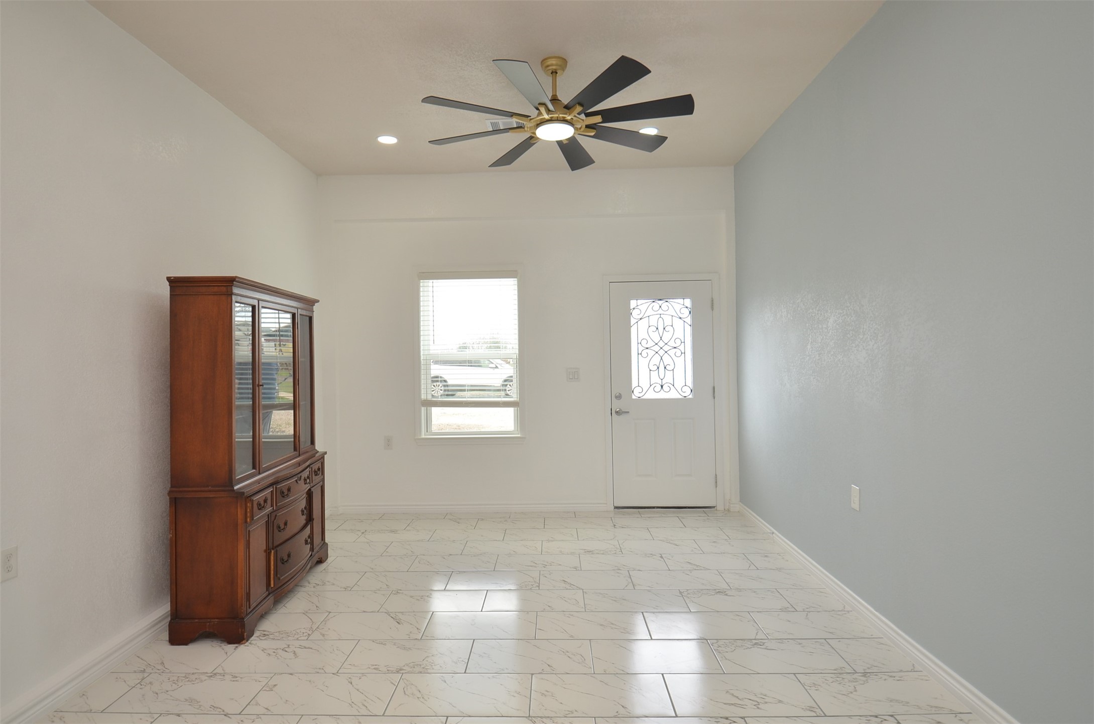 2002 West Airline County Road 55 Rosharon, TX 77583 - Photo 7 of 23 a view of an empty room with a window