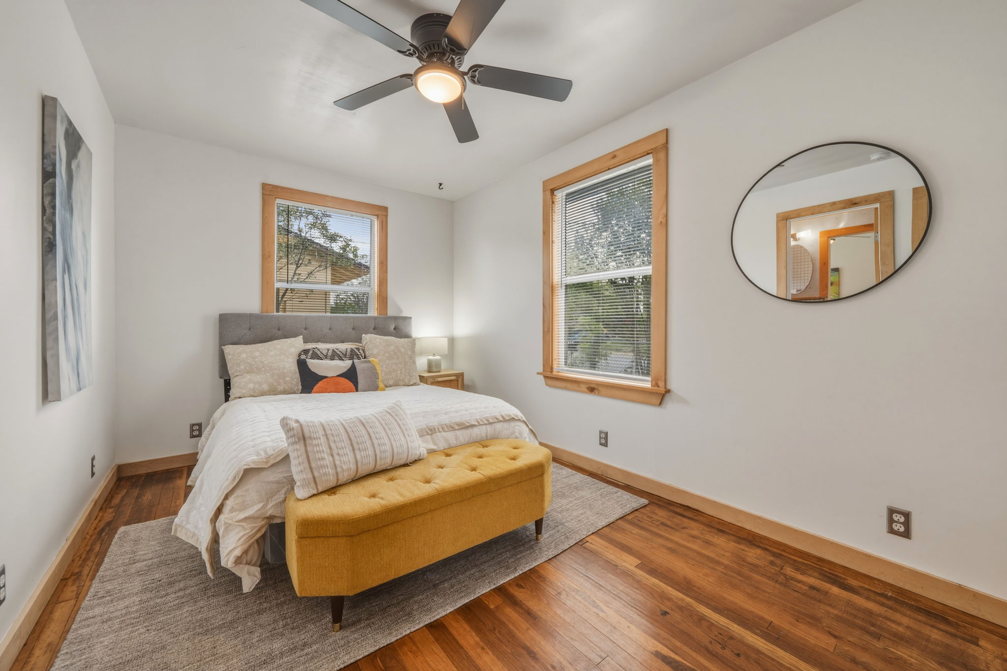 4806 Santa Anna Street Austin, TX 78721 - Photo 12 of 35 a spacious bedroom with a bed and a window