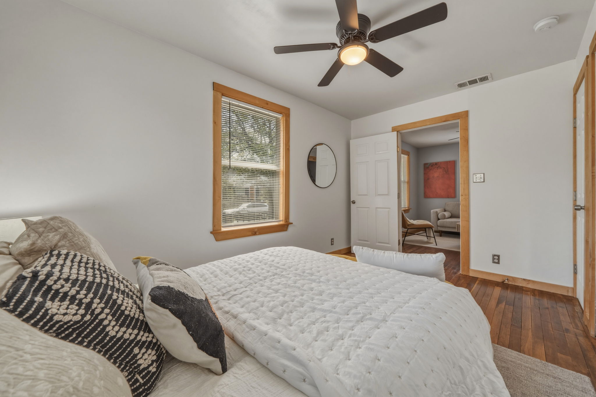 4806 Santa Anna Street Austin, TX 78721 - Photo 15 of 35 a bedroom with a bed and a window