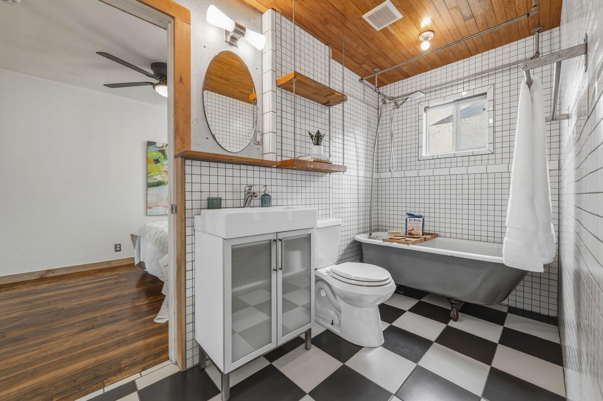 4806 Santa Anna Street Austin, TX 78721 - Photo 20 of 35 a bathroom with a sink and a mirror