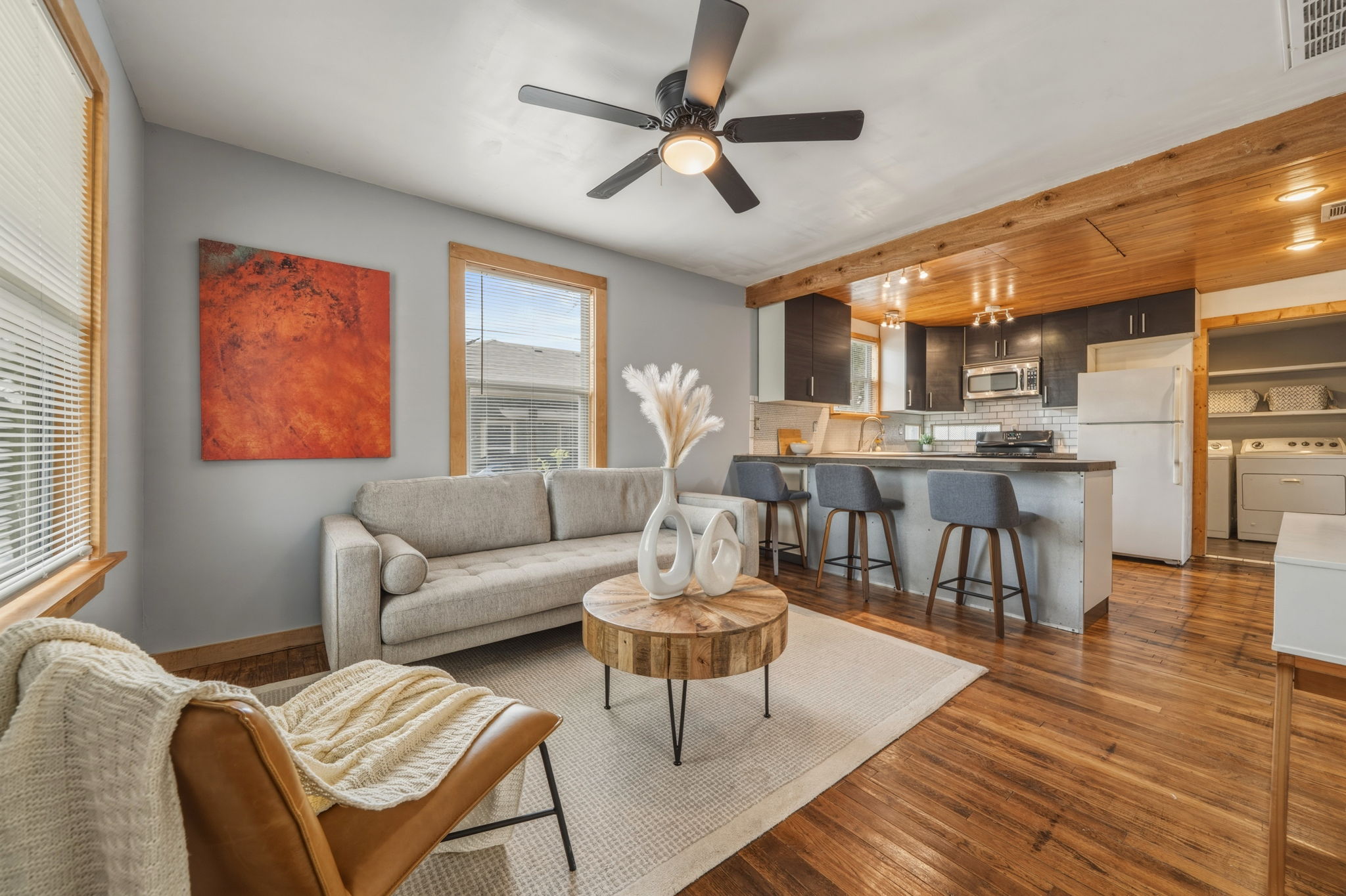 4806 Santa Anna Street Austin, TX 78721 - Photo 2 of 35 Living room featuring wood flooring and ceiling fan