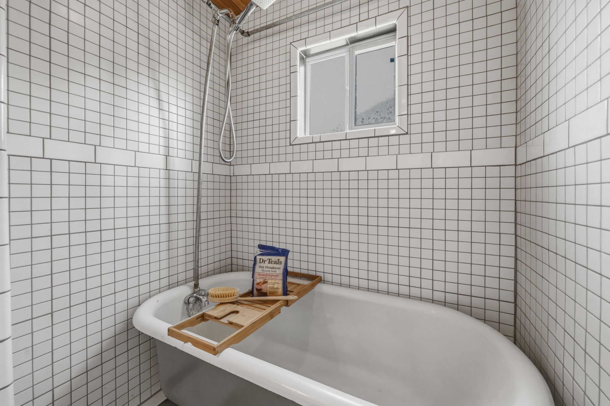 4806 Santa Anna Street Austin, TX 78721 - Photo 22 of 35 a bathroom with a bathtub