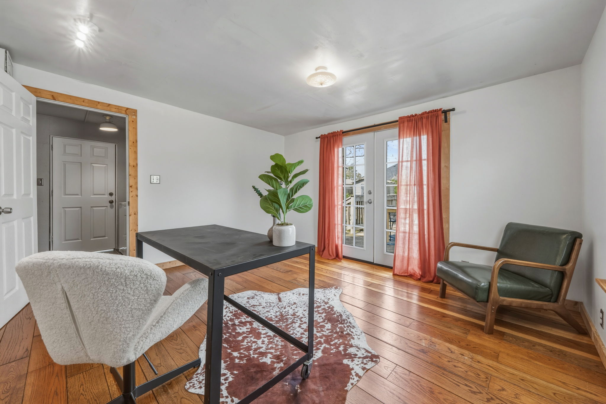 4806 Santa Anna Street Austin, TX 78721 - Photo 26 of 35 a living room with furniture and a window