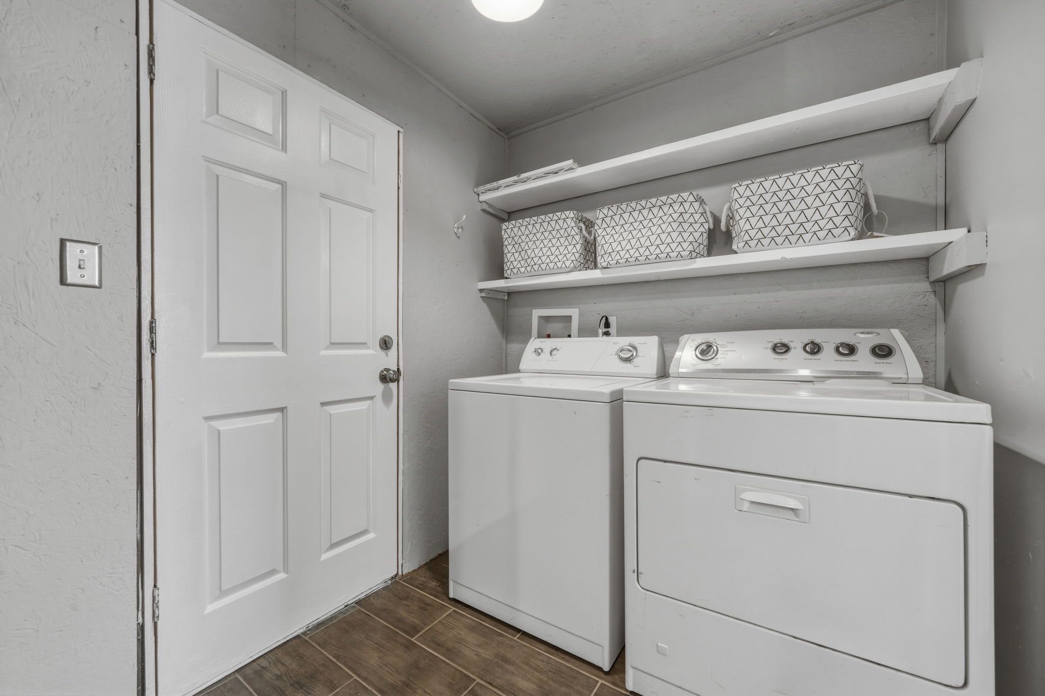 4806 Santa Anna Street Austin, TX 78721 - Photo 29 of 35 Laundry area with tile floors and washer & dryer