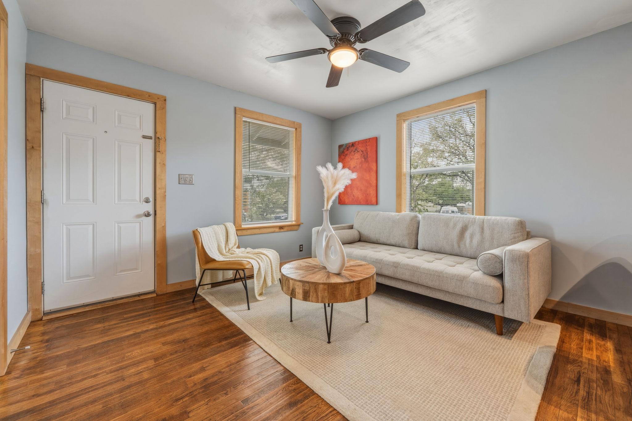 4806 Santa Anna Street Austin, TX 78721 - Photo 3 of 35 a living room with furniture and a large window