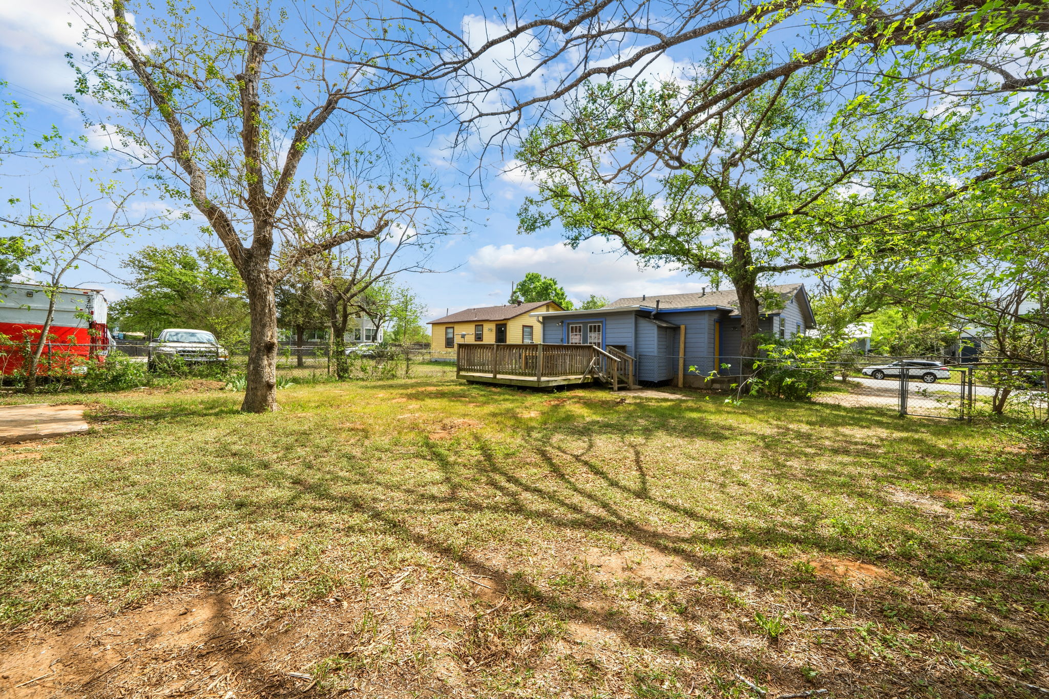 4806 Santa Anna Street Austin, TX 78721 - Photo 33 of 35 a front view of a house with a yard and trees