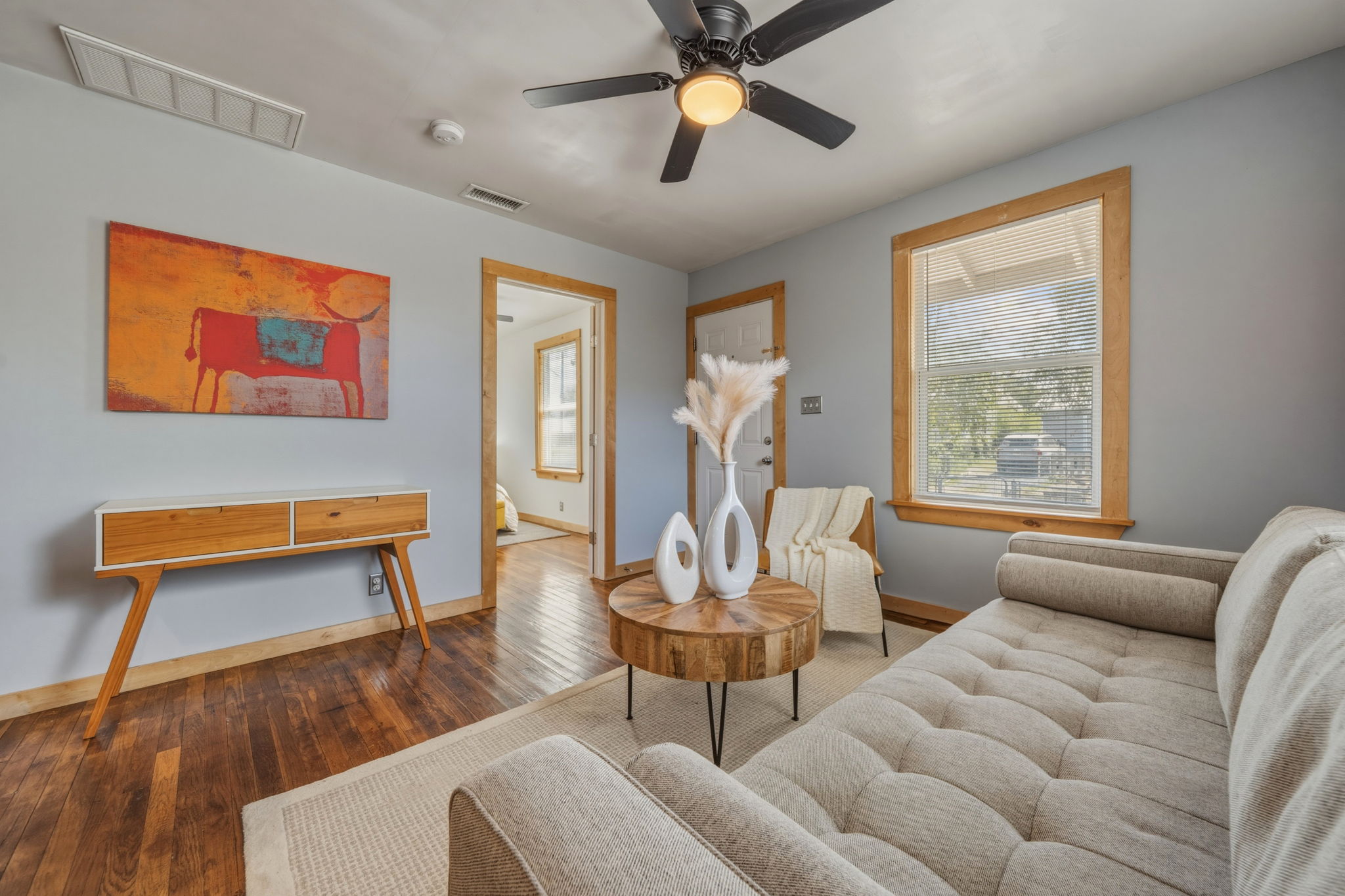 4806 Santa Anna Street Austin, TX 78721 - Photo 4 of 35 a living room with furniture and a window